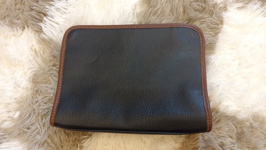 Rudolf Valentino 1921 Leather Clutch (Category: Luxury Bags & Wallets) located in Bulacan. Submitted by garmentsbyadi. (Listing ID 1438108406, Image 2). Description: Rudolf Valentino 1921 Leather Clutch Color: Black and brown Dimension: 7.5x10 Condition: Excellent Color rate: 9/10 Issue: one minimal dent, refer on the last photo Feel free to offer.