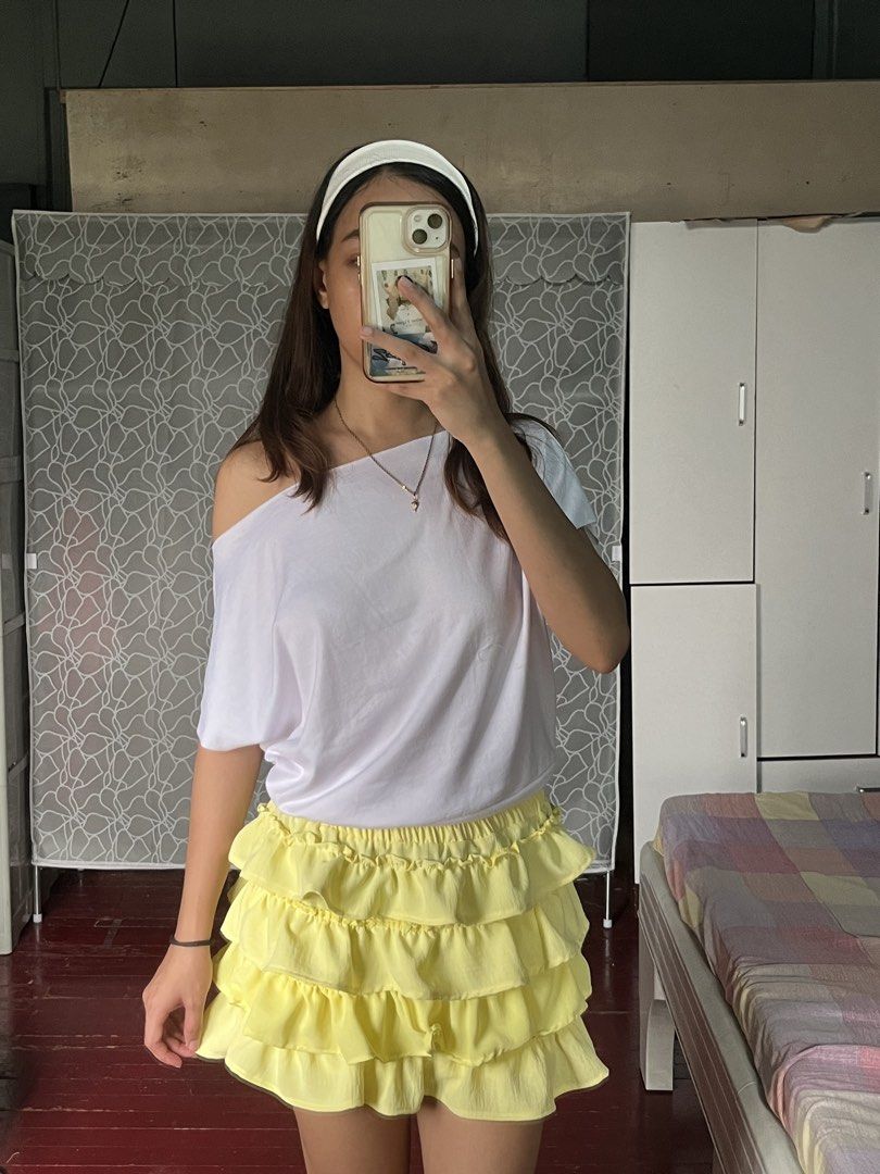 Ruffled Mini Skirt (Category: Skirts) located in Manila. Submitted by notjeujeu (Listing ID 1438092607, Image 2). Description: - Ruffled mini skirt - Elastic waistband - Available colors: Red, Yellow, Brown, Pink - Perfect for casual wear - Comfortable and stylish - Easy to pair with a simple top.