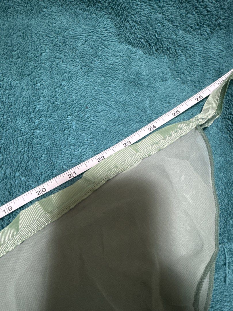 Sage Green Wrap Ballet Skirt (Category: Activewear) located in Pasay City. Submitted by lycheedeclutters (Listing ID 1438078715, Image 3). Description: - Green wrap ballet skirt - Ribbon tie closure - 12 and 1/2 inches in length - 50 inches width (but please take note of the tapered design (4th photo).
