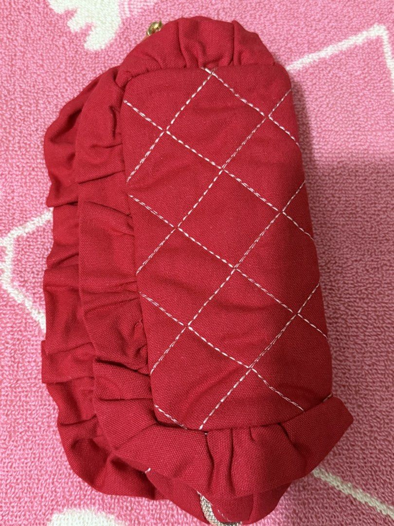 Sanrio 2025 Hello Kitty Quilted Pouch (Category: Purses & Pouches) located in Bacoor. Submitted by vikkavi (Listing ID 1438086049, Image 2). Description: - Brand new Kitty quilted pouch - Features a charming red quilted design - Adorned with a Kitty patch - Elegant gold zipper closure - Interior lined with clean white fabric - Stylish ruffled edge - Diamond pattern adds a touch of flair - Authentic Sanrio product - Comes in original packaging.