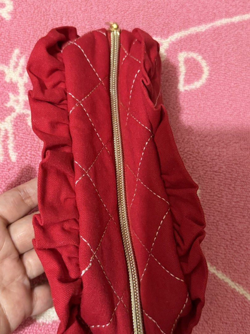 Sanrio 2025 Hello Kitty Quilted Pouch (Category: Purses & Pouches) located in Bacoor. Submitted by vikkavi (Listing ID 1438086049, Image 3). Description: - Brand new Kitty quilted pouch - Features a charming red quilted design - Adorned with a Kitty patch - Elegant gold zipper closure - Interior lined with clean white fabric - Stylish ruffled edge - Diamond pattern adds a touch of flair - Authentic Sanrio product - Comes in original packaging.