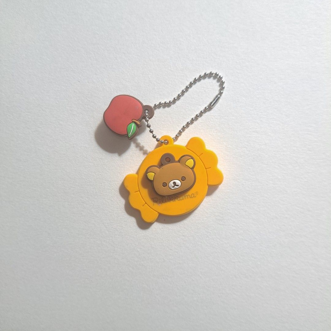 San-x Rilakkuma Keychain with Apple Keychain (Category: Character Goods) located in M'Lang. Submitted by ardinelle.finds (Listing ID 1438013293, Image 1). Description: Feel free to check my listings ~♪ I am willing to give discounts when you buy multiple items 🌱 Location: North Cotabato, Mindanao Couriers accepted: Flash Express, LBC, J&T please don't hesitate to message me for questionsꉂꉂ(ᵔᗜᵔ◍).