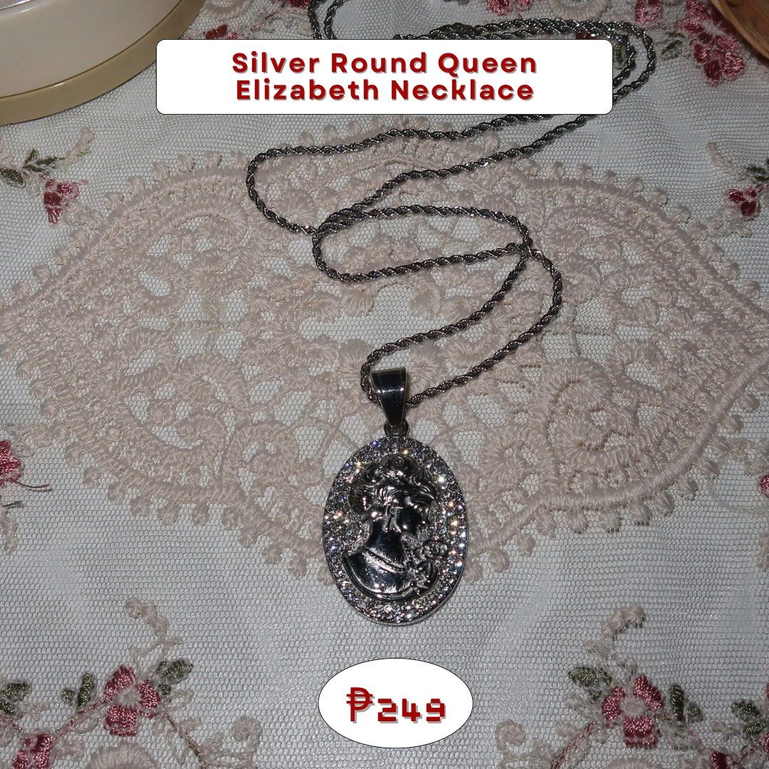 Silver Round Queen Elizabeth Necklace (Category: Necklaces) located in Calamba. Submitted by declutter.rebski (Listing ID 1438085976, Image 1). Description: Silver Round Queen Elizabeth Necklace ₱249 ⤿ high quality, non-tarnish stainless steel jewelry ⤿ hypoallergenic + does not fade over time ⤿ all items are brand new — not preloved & never used! ⤿ each piece comes with its own jewelry case / clear organizer ⤿ onhand and ready to ship ⤿ color ma