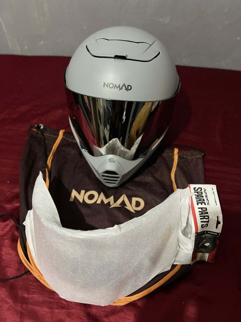 Spyder NOMAD VENTURI Full Face Helmet (Category: Helmets and other Riding Gears) located in Quezon City. Submitted by seeeen (Listing ID 1437975768, Image 1). Description: NEGOTIABLE - size XL 61-62cm - Matte grey color - Tinted visor - Includes unused spare clear visor - Comes with a carrying bag - Unique design with front vent - DOT Approved - Minor scratches as seen from pictures RFS: changing helmet color to match new motor Bought last April 