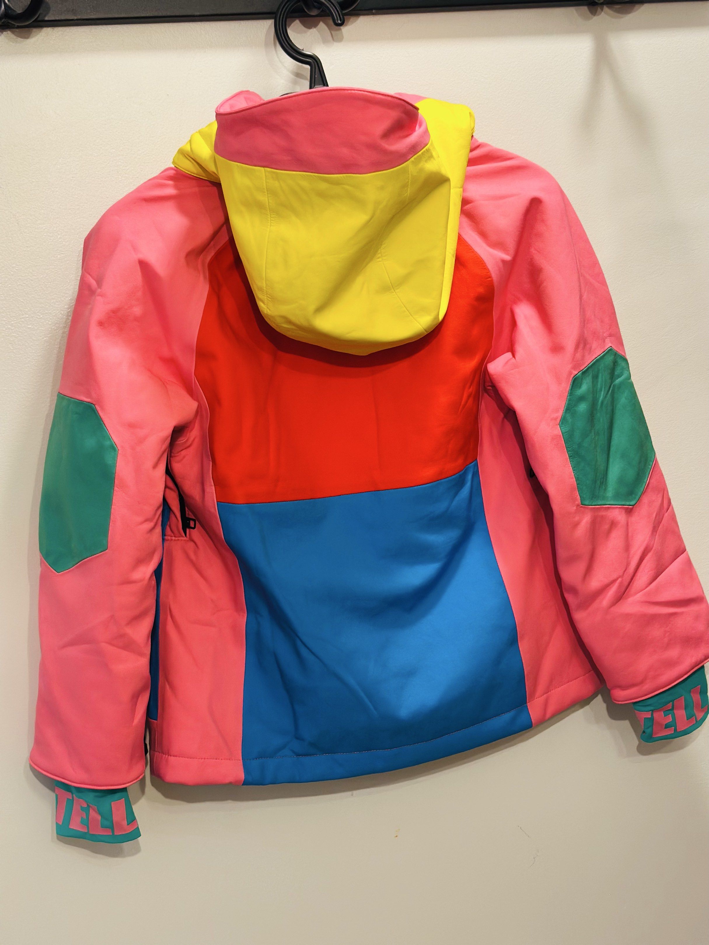 Stella McCartney Kids Ski Jacket 8 Years (Category: Babies & Kids Fashion) located in Baliuag. Submitted by _twinkledust (Listing ID 1437987266, Image 3). Description: - Stella McCartney Kids ski jacket - Vibrant color block design - Size: 8 years - Features a hood - Multiple pockets with zippers - Brand name printed on inner lining and cuffs - Retails for 17k+.