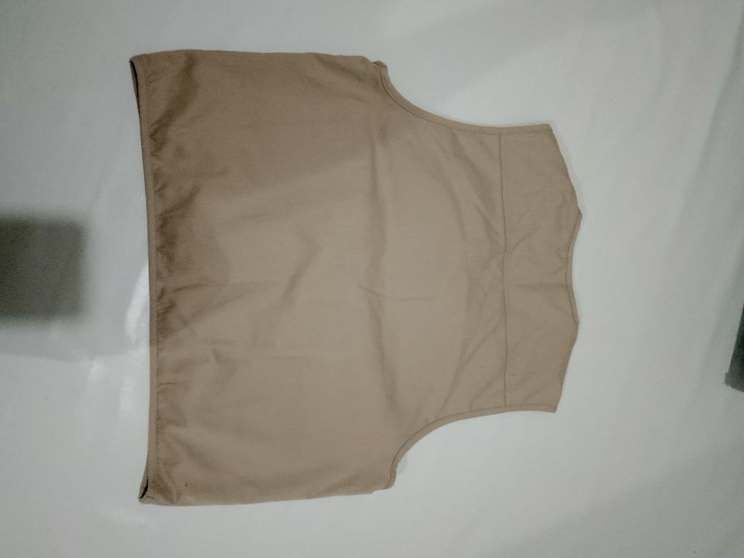 Tan Multi-Pocket Vest (Category: Vests) located in Manila. Submitted by romeoamoro00044 (Listing ID 1438065014, Image 2). Description: - Tan vest - Multiple pockets (6 total) - Zipper closure - Button at waist - Collar - Durable material - Plain back.