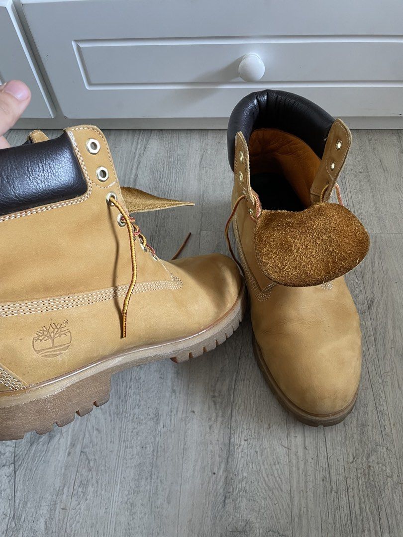 Timberland 6-Inch Premium Waterproof Boots (Category: Boots) located in Manila. Submitted by warmwolf_1f49cc (Listing ID 1438066942, Image 2). Description: - Timberland boots in wheat color - Size: 10.5W - Material: Leather upper, manmade linings and outsole - Features padded collar and lace-up closure - Timberland logo embossed on the side - Suitable for various weather conditions.