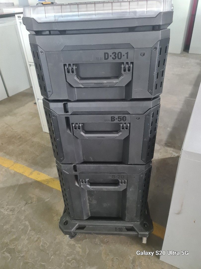 Toughbuilt StackTech Rolling Toolbox (Category: Storage Boxes & Baskets) located in Makati City. Submitted by mandiajan62104 (Listing ID 1437986537, Image 2). Description: - Toughbuilt StackTech Rolling Toolbox - Durable construction for tough jobs. - Multiple compartments for organized storage. - Rolling base for easy transport. - Modular design for stacking and customization. - Features Toughbuilt branding and orange accents. - Includes handles