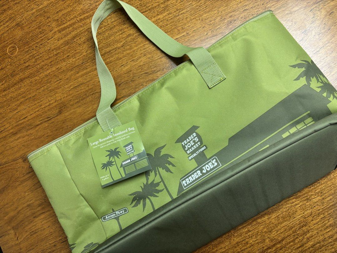 Trader Joe's Large Reusable Insulated Bag (Category: Food Organization & Storage) located in Taguig. Submitted by so0224 (Listing ID 1437995023, Image 2). Description: - Keeps groceries cold. - Features a zip closure. -standard Large Insulated Bag (approx. 18”W x 13”H x 6.5”D, 7–8 gallon capacity) Location: BGC .