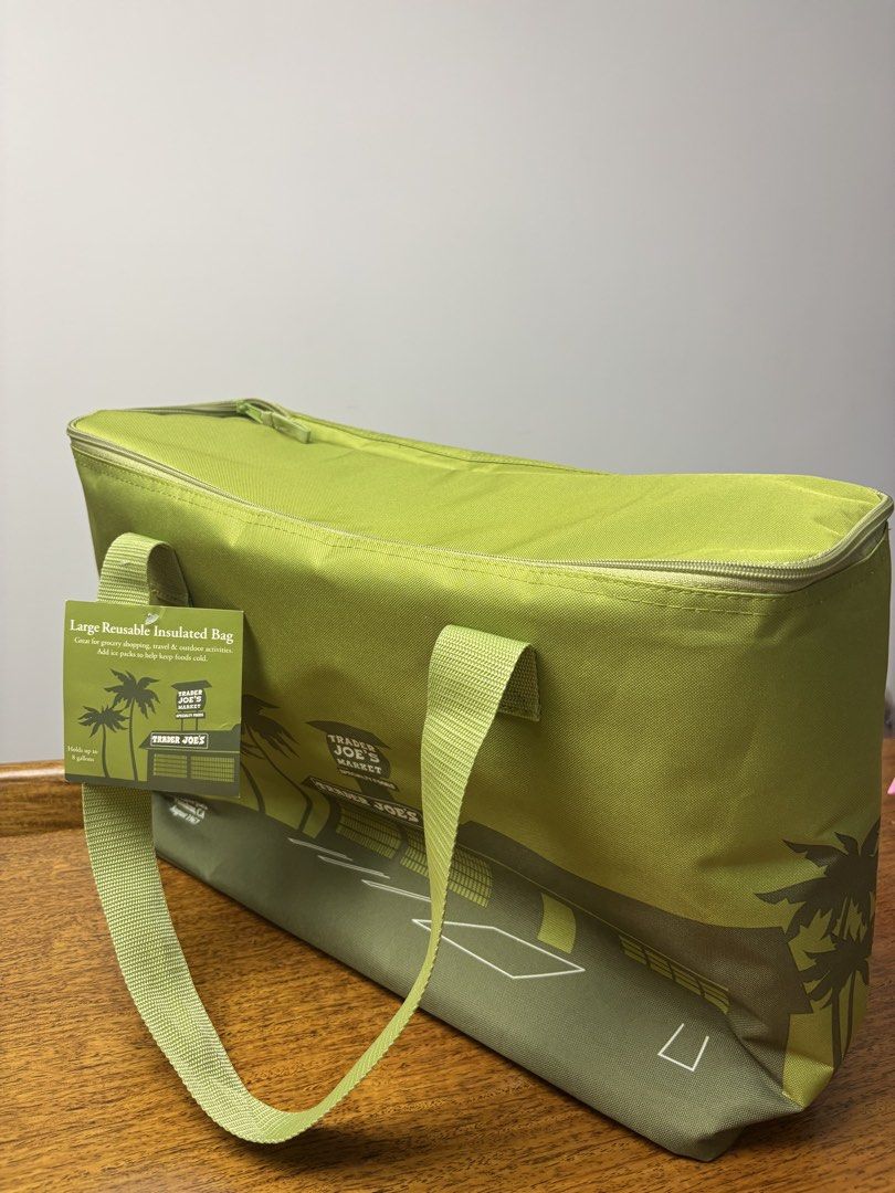 Trader Joe's Large Reusable Insulated Bag (Category: Food Organization & Storage) located in Taguig. Submitted by so0224 (Listing ID 1437995023, Image 1). Description: - Keeps groceries cold. - Features a zip closure. -standard Large Insulated Bag (approx. 18”W x 13”H x 6.5”D, 7–8 gallon capacity) Location: BGC .