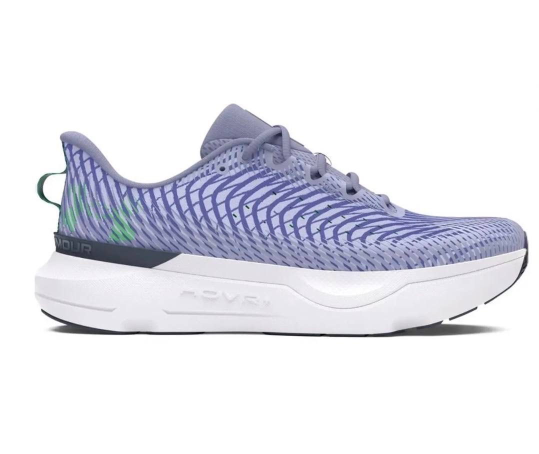 Under Armour HOVR+ Running Shoes (Category: Sneakers) located in Makati City. Submitted by ceejaaay94 (Listing ID 1437995895, Image 3). Description: - Under Armour HOVR+ running shoes - Light purple and white colorway - Breathable upper with a unique striped pattern - White sole with dark grey outsole - Cushioned midsole for comfort - Features a pull tab at the heel - Under Armour logo visible.