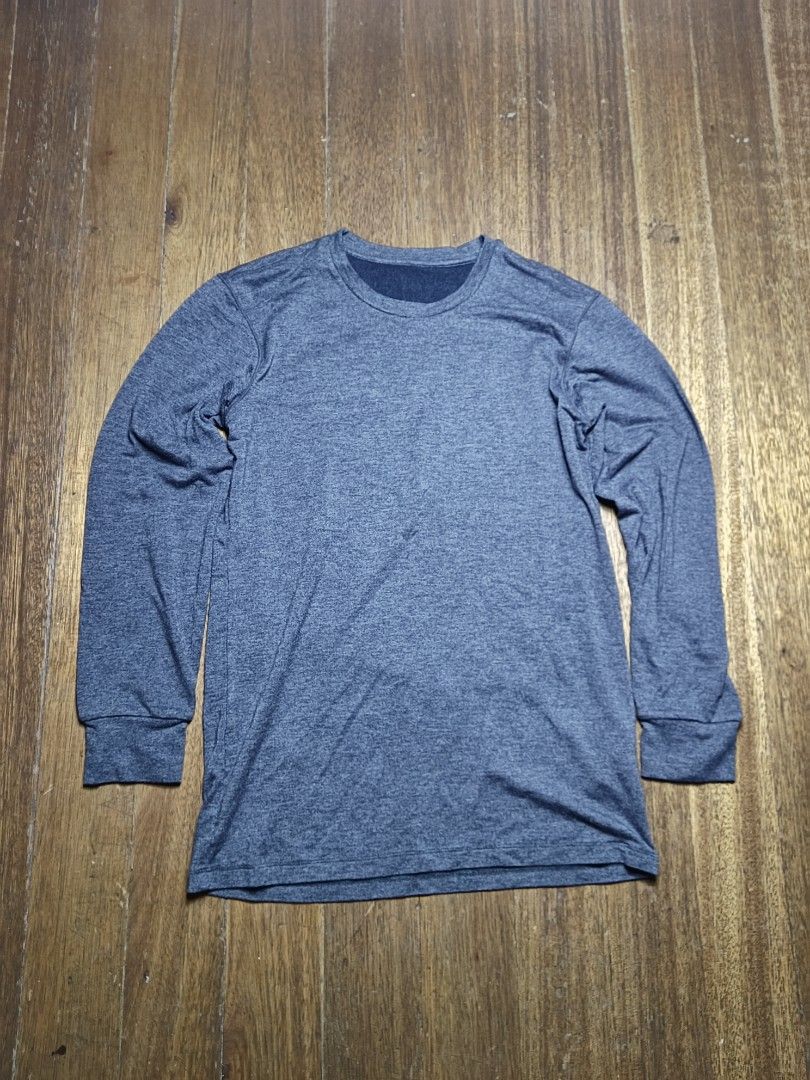 Uniqlo Heattech Extra Warm small mens (Category: Coats, Jackets and Outerwear) located in Mandaluyong City. Submitted by heatgear (Listing ID 1438000845, Image 1). Description: - Uniqlo Heattech Extra Warm long sleeve shirt - Dark grey color - Size: S - Crew neck - Long sleeves - Made with acrylic, rayon, polyester, and spandex - Made in China chest 80-88 cm 300 + sf location mandaluyong.
