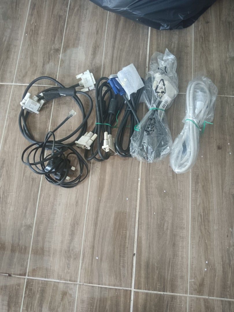 Various Computer Cables (Category: Cables & Adaptors) located in Yan. Submitted by marianiz (Listing ID 1437995376, Image 1). Description: - Assorted computer cables - Includes power cables and VGA cables - Variety of connectors included - Perfect for computer or monitor setup/replacement - Exact types and quantities as shown in images.
