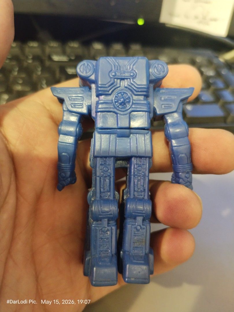 Vintage Bandai 1995 Robot (Category: Figurines & Statues) located in Pasay City. Submitted by mancave07 (Listing ID 1438042432, Image 2). Description: - Vintage robot action figure - Blue and gold color scheme - Intricate details - Unique pharaoh-like head design - Detailed back - Made of plastic - Great for toy collectors!.