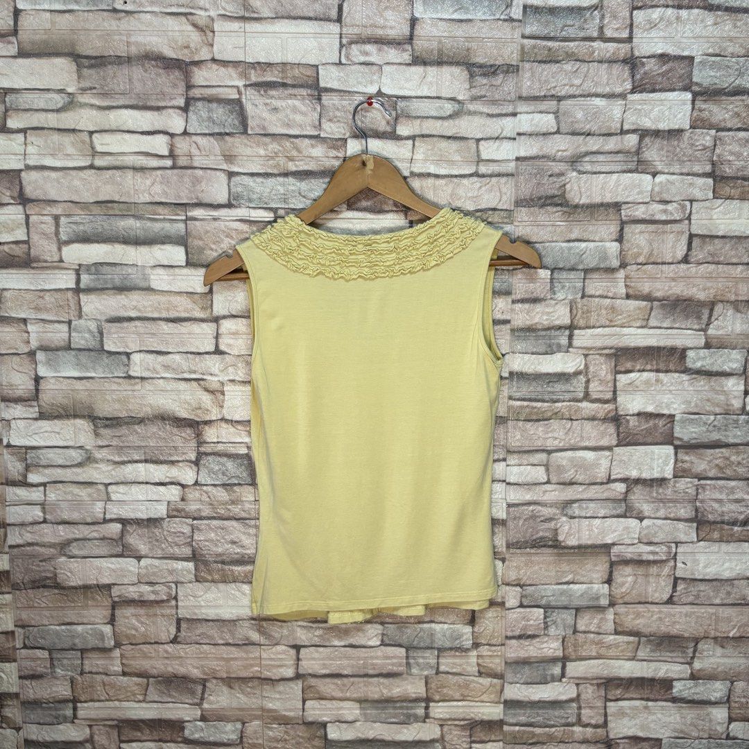 Vintage MaxMara Weekend Line Sleeveless Top (Category: Sleeveless) located in Bacolod City. Submitted by treasurehuntsv2 (Listing ID 1438019424, Image 3). Description: Condition: Excellent — no issues Color: Soft pastel yellow Brand: MaxMara Weekend Line (Made in Italy) 📏 Dimensions: 16.5 x 21 inches • Pit to Pit: 16.5” • Length: 21” ✔ No stains ✔ No holes ✔ No flaws ✔ Ready to wear.