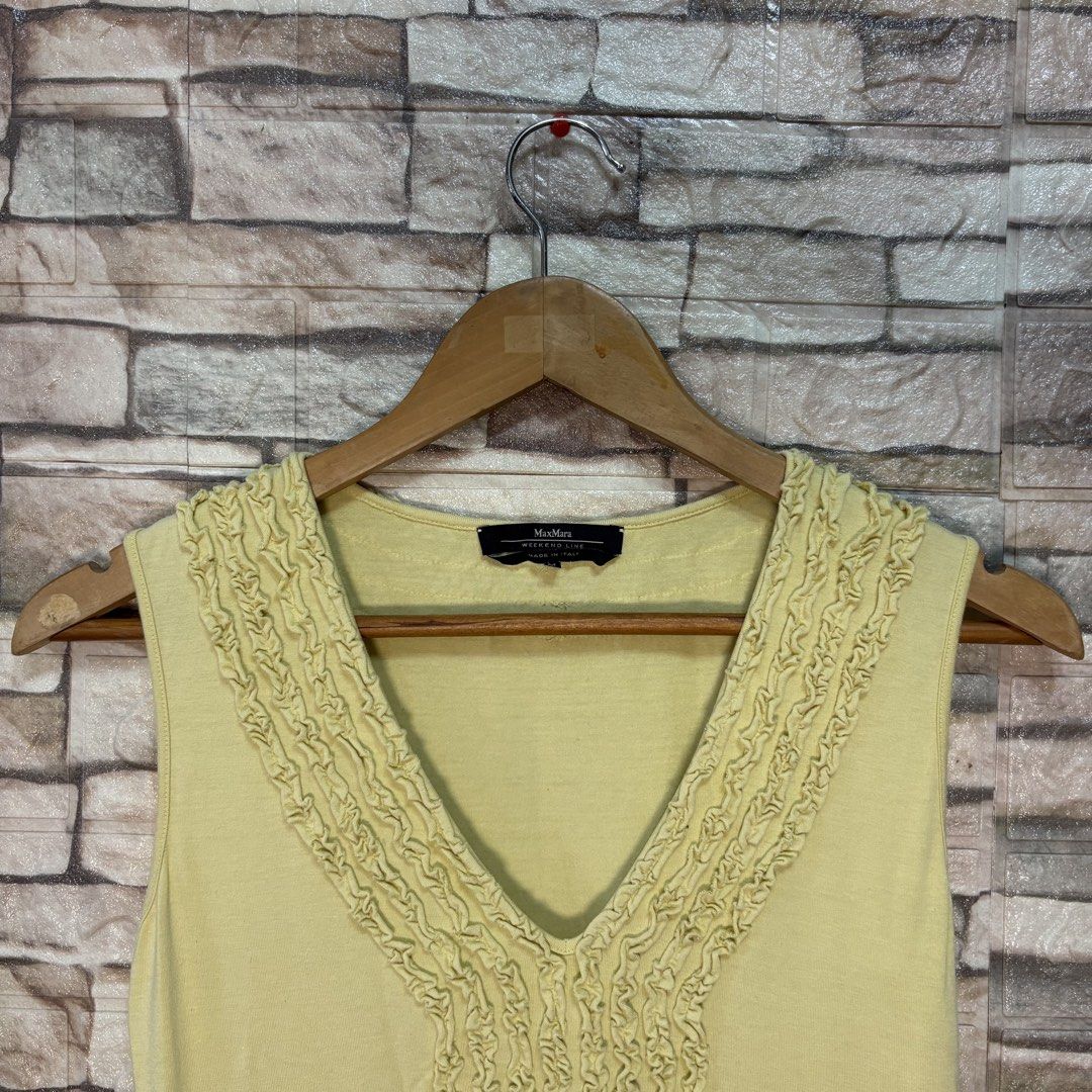 Vintage MaxMara Weekend Line Sleeveless Top (Category: Sleeveless) located in Bacolod City. Submitted by treasurehuntsv2 (Listing ID 1438019424, Image 2). Description: Condition: Excellent — no issues Color: Soft pastel yellow Brand: MaxMara Weekend Line (Made in Italy) 📏 Dimensions: 16.5 x 21 inches • Pit to Pit: 16.5” • Length: 21” ✔ No stains ✔ No holes ✔ No flaws ✔ Ready to wear.