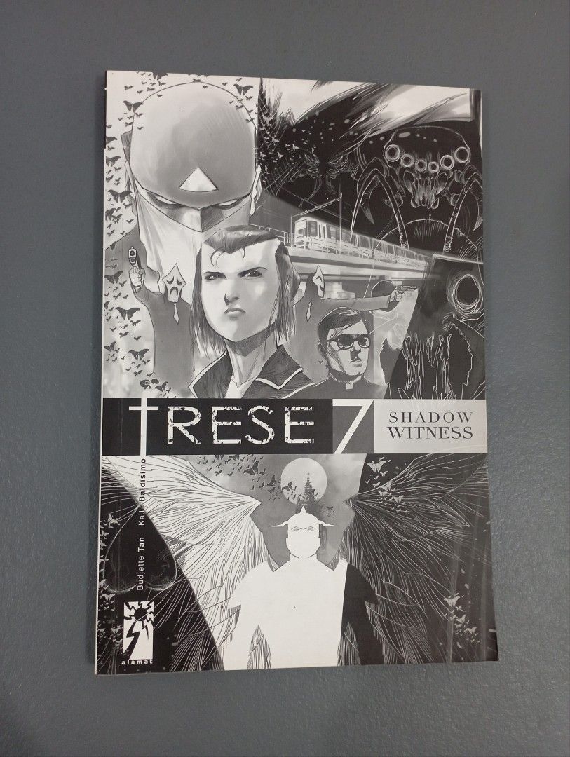 Visprint Version Trese 7: Shadow Witness (Category: Comics & Manga) located in Las Pinas. Submitted by luke.the6th (Listing ID 1438078018, Image 1). Description: - Trese 7: Shadow Witness comic book - Features black and white illustrations - Cover art includes a woman, a masked figure, and other characters - Published by Visprint.