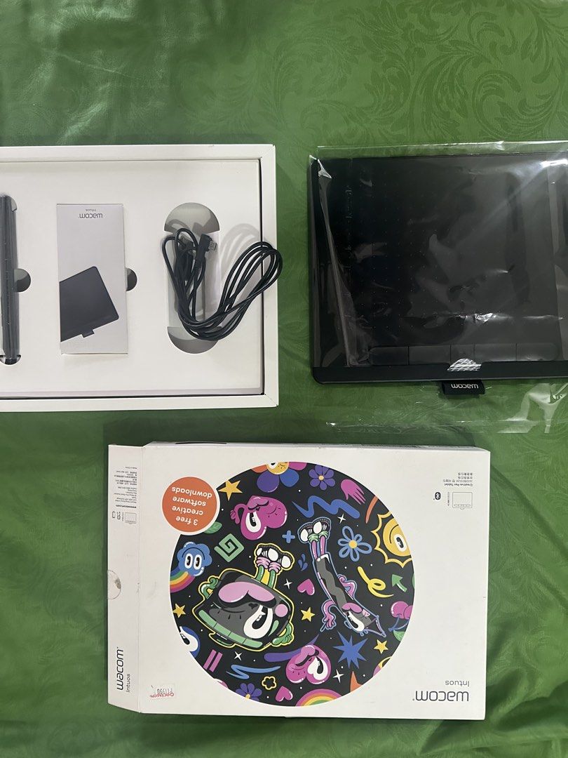 Wacom Intuos BT Medium graphic drawing pen tablet with wireless (Category: Other Accessories) located in Manila. Submitted by nickzsandiego (Listing ID 1436958019, Image 1). Description: Wacom Intuos BT with wireless feature (box included). Good for graphic design, art, and gaming - among the top pen tablet brands alongside Huion. Compatible with both Windows and Mac OS. Comes with (all original + packaging): 1. Tablet 2. Pen with extra nibs 3. C