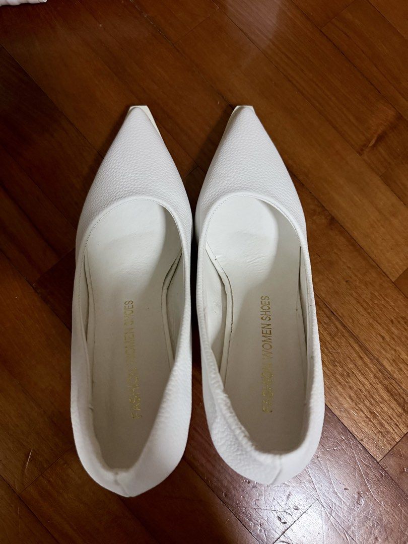 White Pointed-Toe Heels (Category: Heels) located in Singapore. Submitted by jayceeldw (Listing ID 1438080598, Image 1). Description: - Elegant white heels - Pointed toe - Textured finish - Stiletto heel - Clean soles - Unworn condition.