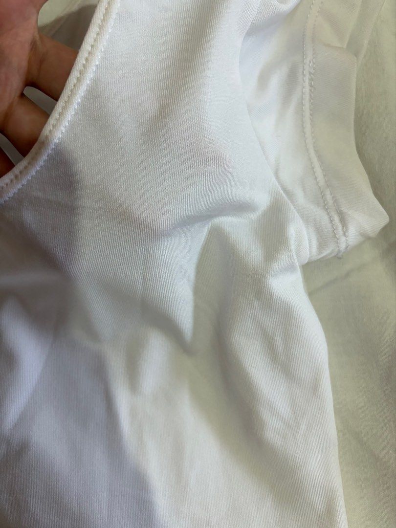 White Scoop Neck Top (Category: Blouses) located in Manila. Submitted by andreacap (Listing ID 1437967345, Image 2). Description: - White scoop neck top - Short sleeves - Fitted silhouette - Smooth, likely synthetic fabric - Solid white color - Perfect for casual wear 🎀 currently decluttering/selling pre-loved clothes, check my page for more details! 🎀 please manage expectations, you may send me a dm for more photos 🎀 my tops and bottoms fits 