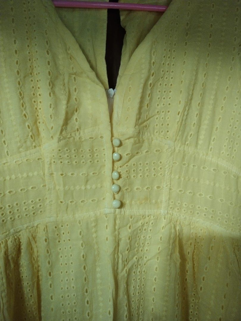 Yellow Eyelet Dress (Category: Dresses) located in Manila. Submitted by fiercefish.b07a25 (Listing ID 1437939438, Image 2). Description: - Yellow eyelet midi dress - V-neckline - Short sleeves with tie details - Button-down front - Features pockets - Gathered skirt - With inner lining - With side pockets - Back neck button and zipper closure LAST PIC FOR REFERENCE ONLY (What it looks like when wearing) MEASUREMENTS: BUST 32 - 34 INCHES WAIST 26 -