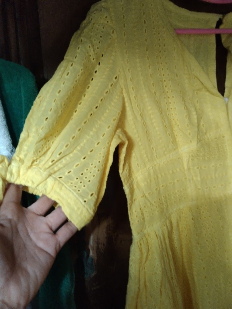 Yellow Eyelet Dress (Category: Dresses) located in Manila. Submitted by fiercefish.b07a25 (Listing ID 1437939438, Image 3). Description: - Yellow eyelet midi dress - V-neckline - Short sleeves with tie details - Button-down front - Features pockets - Gathered skirt - With inner lining - With side pockets - Back neck button and zipper closure LAST PIC FOR REFERENCE ONLY (What it looks like when wearing) MEASUREMENTS: BUST 32 - 34 INCHES WAIST 26 -