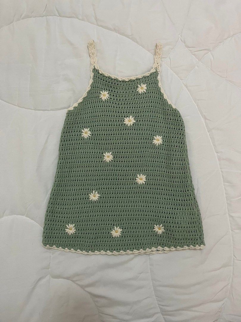 Zara Crochet Daisy Dress (Category: Babies & Kids Fashion) located in Makati City. Submitted by prelovedbykatsuandchanel (Listing ID 1438036237, Image 1). Description: - Handmade crochet dress - Features a green base - Adorned with daisy embellishments - Scoop neckline and straps - Finished with cream-colored trim - Perfect for a casual, summery style.