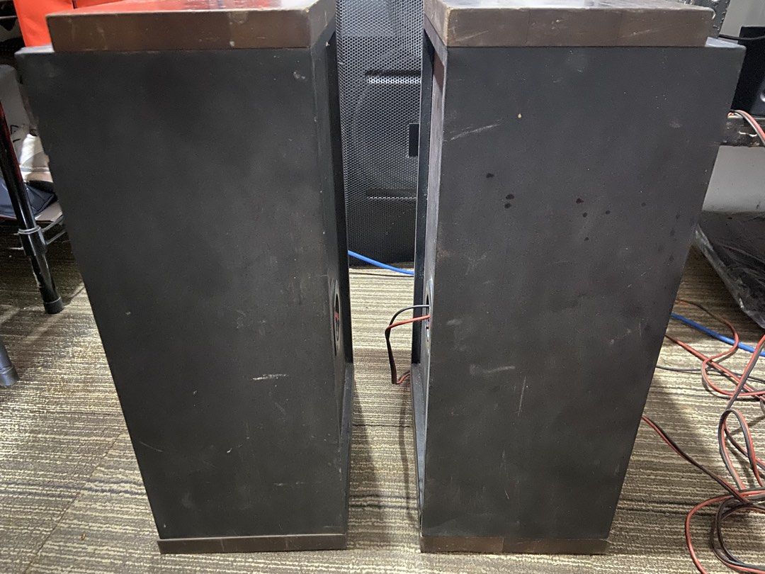 Acoustic Research TSW 210 Speakers (Category: Soundbars, Speakers & Amplifiers) located in Manila. Submitted by cosmiccloud-adf7 (Listing ID 1438267493, Image 2). Description: - Acoustic Research TSW 210 speakers - Black cabinet with wooden accents - Visible wear and tear on front (speaker cones and fabric) - Speaker wire terminals on the back - Made by Teledyne Acoustic.