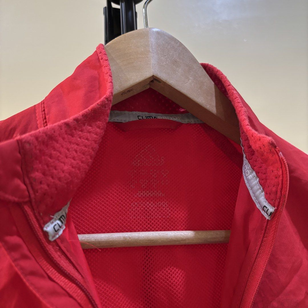 Adidas Clima Jacket - Red (Category: Coats, Jackets and Outerwear) located in Quezon City. Submitted by declutternami (Listing ID 1438205389, Image 2). Description: - Adidas Clima jacket - Red color - Iconic three stripes on sleeves - Full zip closure - Stand-up collar - Lightweight material - Mesh lining - Adidas logo on collar Medium size As is rfs: Declutter Pickup only: QC loc.