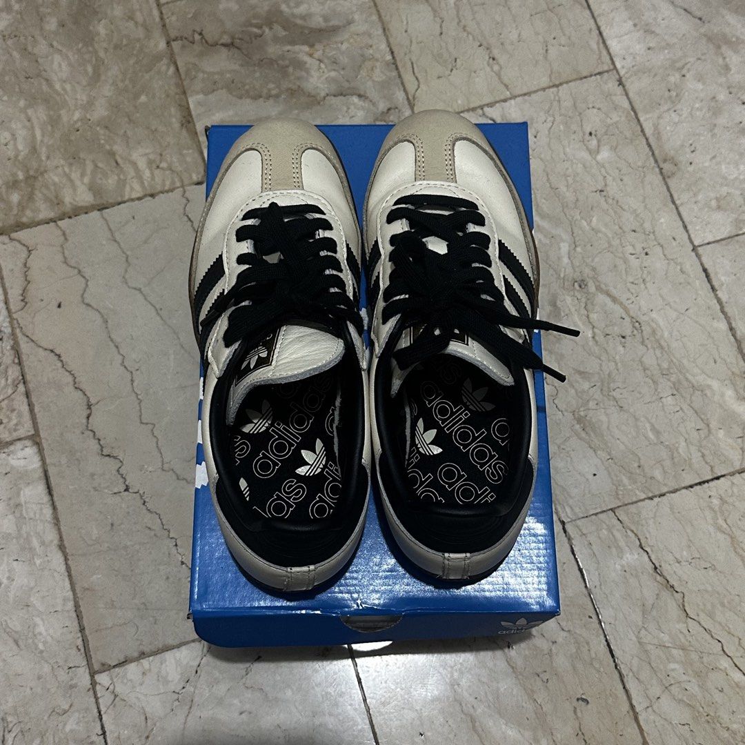 Adidas Samba OG W Sneakers (Category: Sneakers) located in Paranaque City. Submitted by gelayn (Listing ID 1438113507, Image 1). Description: - Adidas Samba OG W - brown and black colorway - US size 7.5 / UK size 6 - Brown soles - Black laces - Includes original box - Original price: PHP 6,800.00.