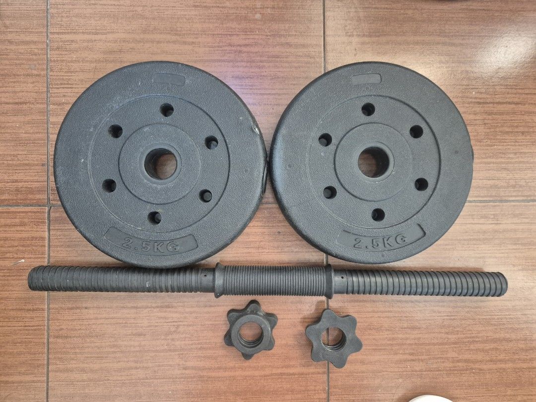 Adjustable Dumbbell Set 5KG (Category: Weights & Dumbbells) located in Makati City. Submitted by zotag (Listing ID 1438301923, Image 2). Description: - Adjustable dumbbell set for home use. - Includes: two 2.5KG weight plates, dumbbell bar, and collars. - Threaded bar design for secure weight plate attachment. - Great for various strength training exercises. - Ideal for building muscle and improving fitness..
