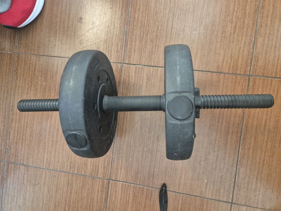 Adjustable Dumbbell Set 5KG (Category: Weights & Dumbbells) located in Makati City. Submitted by zotag (Listing ID 1438301923, Image 1). Description: - Adjustable dumbbell set for home use. - Includes: two 2.5KG weight plates, dumbbell bar, and collars. - Threaded bar design for secure weight plate attachment. - Great for various strength training exercises. - Ideal for building muscle and improving fitness..