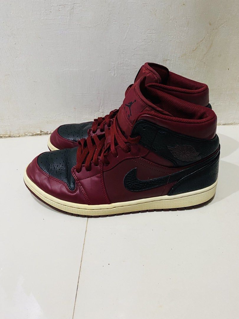 Air Jordan 1 Mid - Reverse Banned size 11 (Category: Sneakers) located in Manila. Submitted by alsytan (Listing ID 1438246533, Image 3). Description: - Air Jordan 1 Mid sneakers - Colorway: Maroon and Black - Features the Air Jordan logo on the tongue - Nike swoosh on the sides - Black toe box and heel - Maroon upper and laces - Off-white soles.