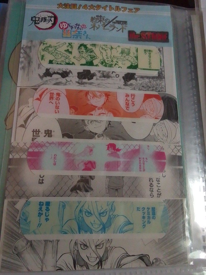 Anime Band Aid Set (Kimetsu no Yaiba, Promised Neverland, and Dr. Stone (Category: Stationery & School Supplies) located in Santa Rosa. Submitted by animemerchcollection (Listing ID 1438162851, Image 1). Description: - Anime-themed set - Features characters and scenes from different anime series - Includes multiples Manga Art with unique designs - Made of a thin, paper-like material - Designs include text and illustrations.