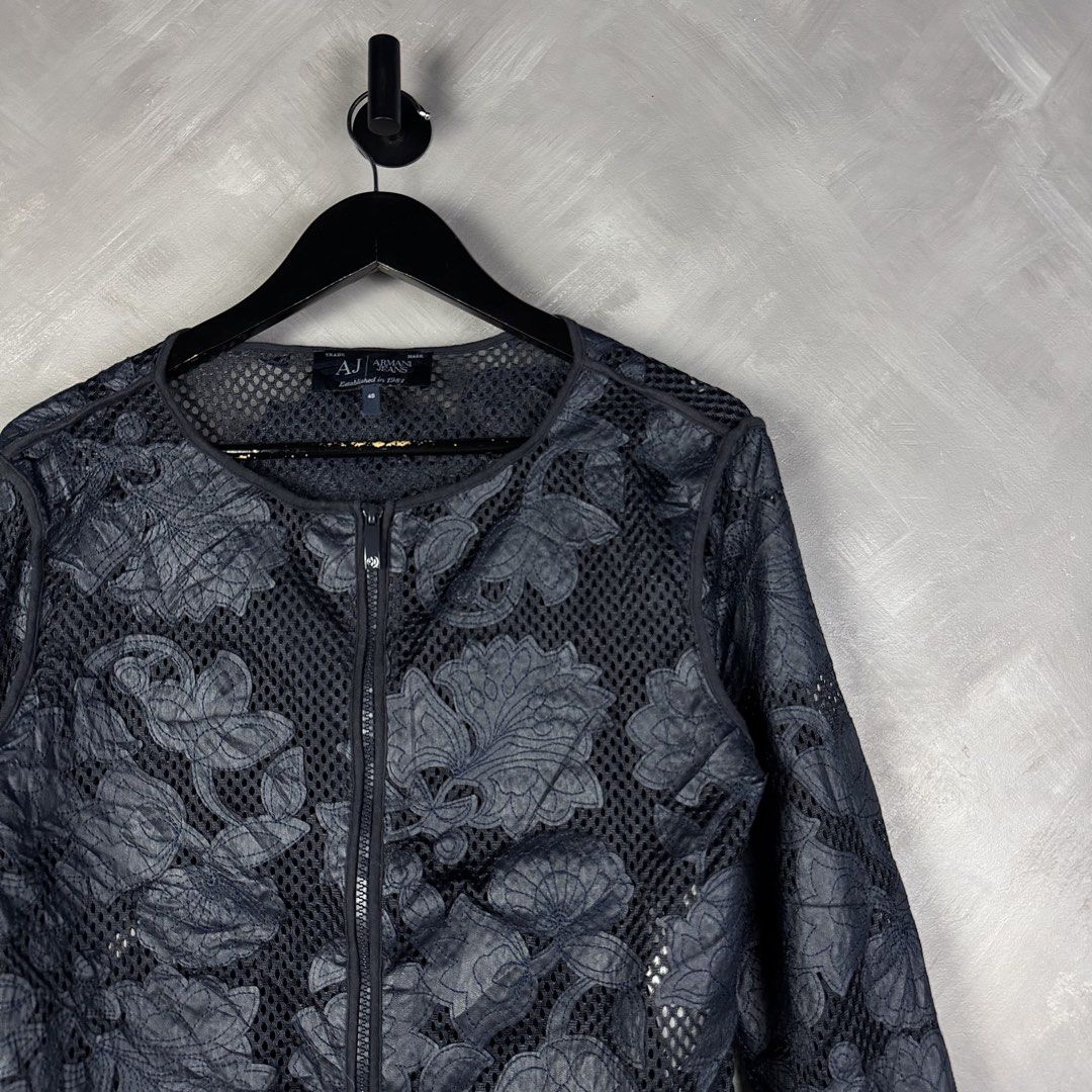 Armani Jeans Leather Floral Mesh Jacket (Category: Coats, Jackets and Outerwear) located in Manila. Submitted by heatthrifts (Listing ID 1438121341, Image 2). Description: - Armani Jeans jacket - Floral mesh design - Full-length zipper - Long sleeves - Dark color (navy or black) - Size 40 - Made in China.