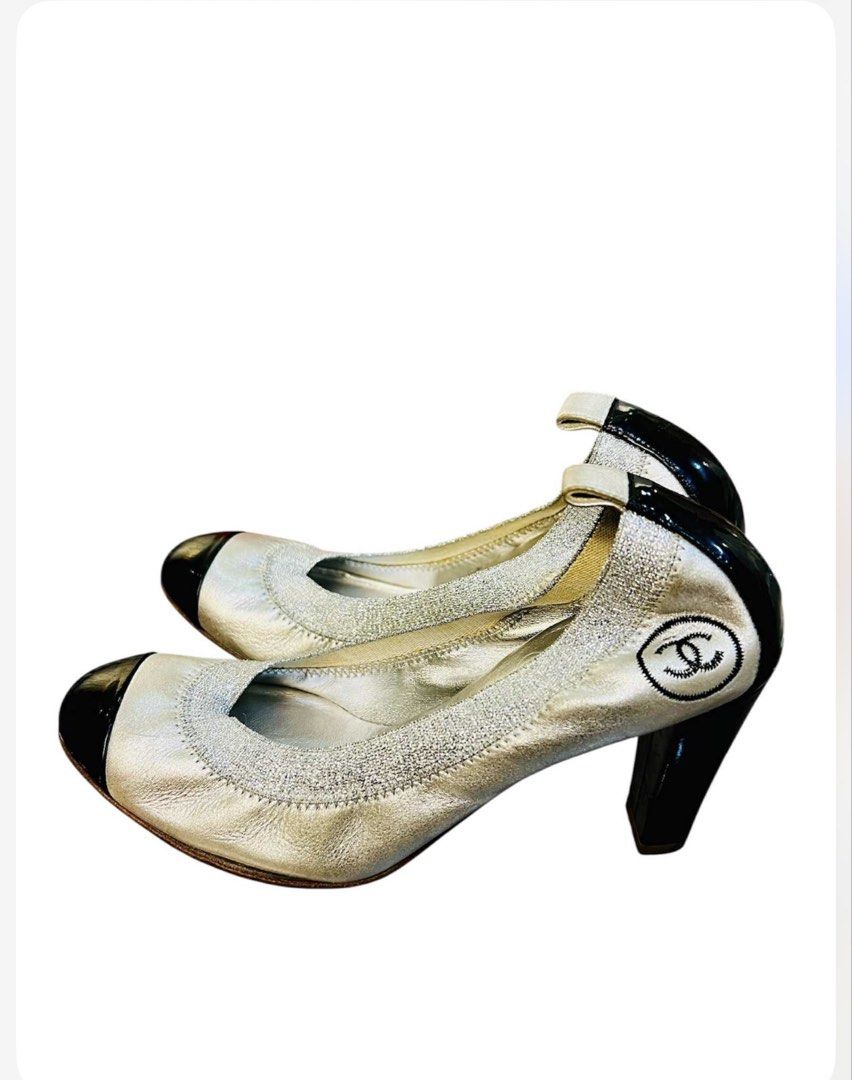 Authentic Chanel Silver/Black Patent Leather Cap Toe Pumps (Category: Sneakers & Footwear) located in Quezon City. Submitted by noblecloud.80f334 (Listing ID 1438210617, Image 2). Description: Please refer to the last photo for a full description and condition details..