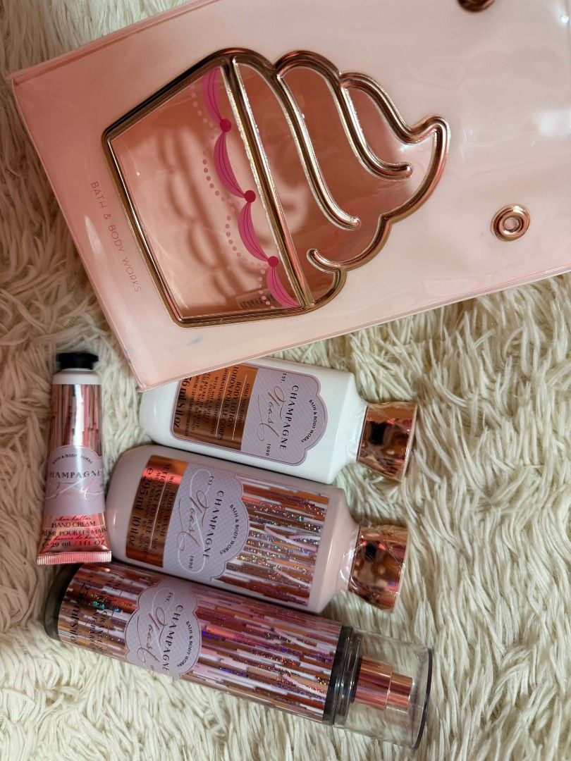 Bath & Body Works Champagne Toast Set (Category: Fragrance & Deodorants) located in Marikina City. Submitted by jheiseanne (Listing ID 1438256762, Image 3). Description: - Complete Champagne Toast set from Bath & Body Works - Includes: body lotion, body wash, fine fragrance mist, and hand cream - Comes with a pink gift bag - Features a beautiful pink and rose gold design - Perfect for gifting or personal use Take all for 1800.