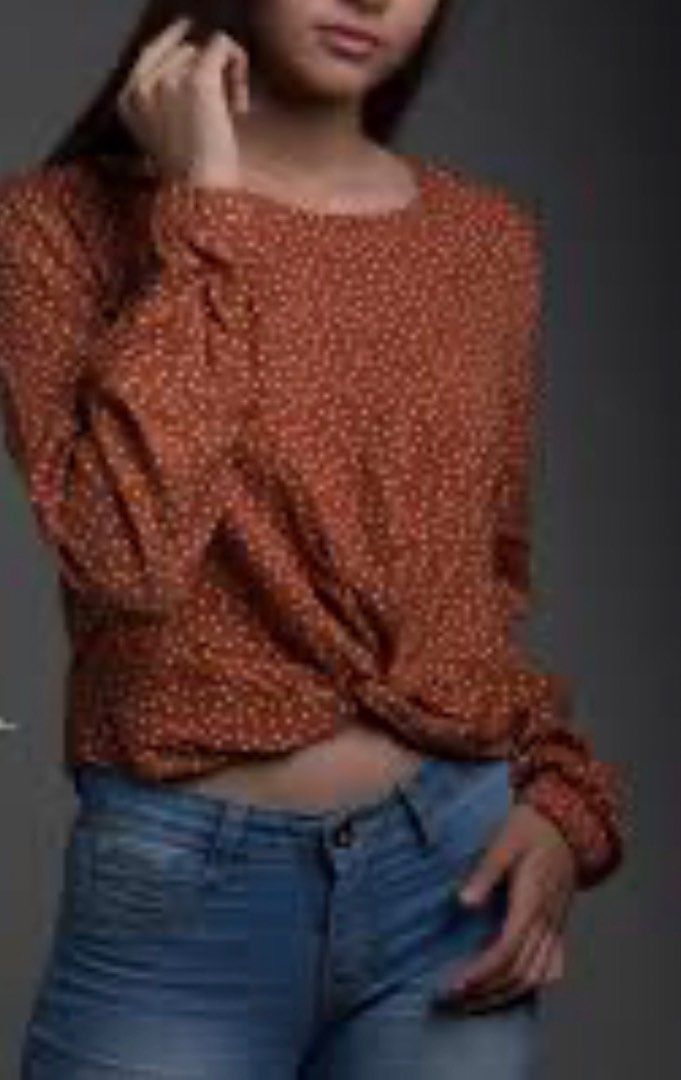 Bershka Polka Dot Blouse (Category: Blouses) located in Mandaluyong City. Submitted by declutterrie (Listing ID 1434331875, Image 1). Description: - Bershka blouse - Unique twist-front design - Long sleeves with flared cuffs - Fits S to M - Back features three buttons - Size: EUR/XS.