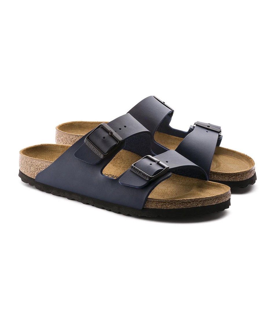 Birkenstocks Arizona Sandals (Category: Slippers & Slides) located in Makati City. Submitted by nooktown (Listing ID 1438242275, Image 3). Description: Birkenstocks Arizona Sandals • navy blue - size 38 only available • brand new • 1 pair left flaw: damaged shoebox.