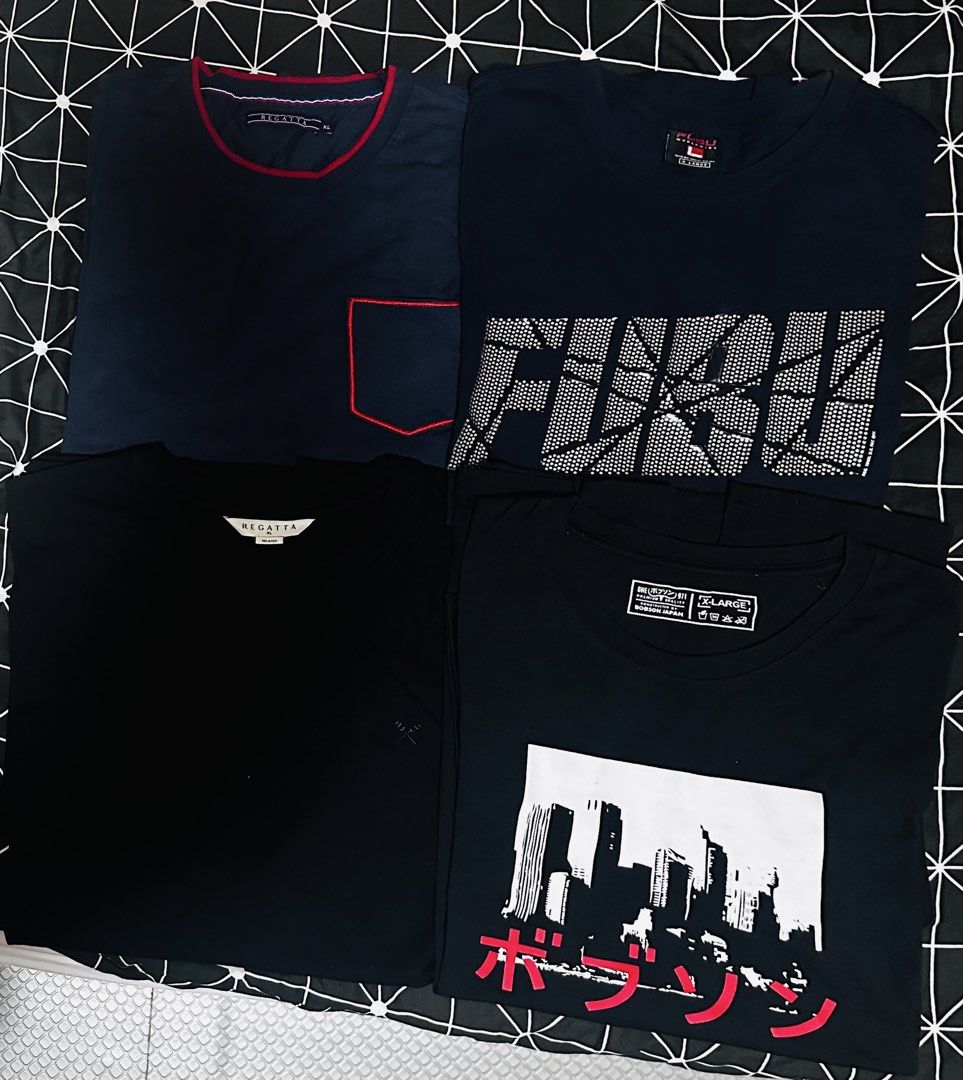 Branded Assorted T-shirts - Regatta, Fubu, Bobson Bundle (Category: Tshirts & Polo Shirts ) located in Tagum. Submitted by itscookiemonster (Listing ID 1438256206, Image 1). Description: - Assorted t-shirt bundle - Includes: - Navy blue Regatta shirt with red pocket - Black Regatta shirt - Navy blue Fubu shirt with graphic design - Bobson Black shirt with cityscape design - Sizes: XL - Style: Short-sleeved.