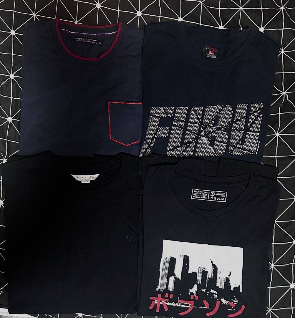 Branded Assorted T-shirts - Regatta, Fubu, Bobson Bundle (Category: Tshirts & Polo Shirts ) located in Tagum. Submitted by itscookiemonster (Listing ID 1438256206, Image 2). Description: - Assorted t-shirt bundle - Includes: - Navy blue Regatta shirt with red pocket - Black Regatta shirt - Navy blue Fubu shirt with graphic design - Bobson Black shirt with cityscape design - Sizes: XL - Style: Short-sleeved.