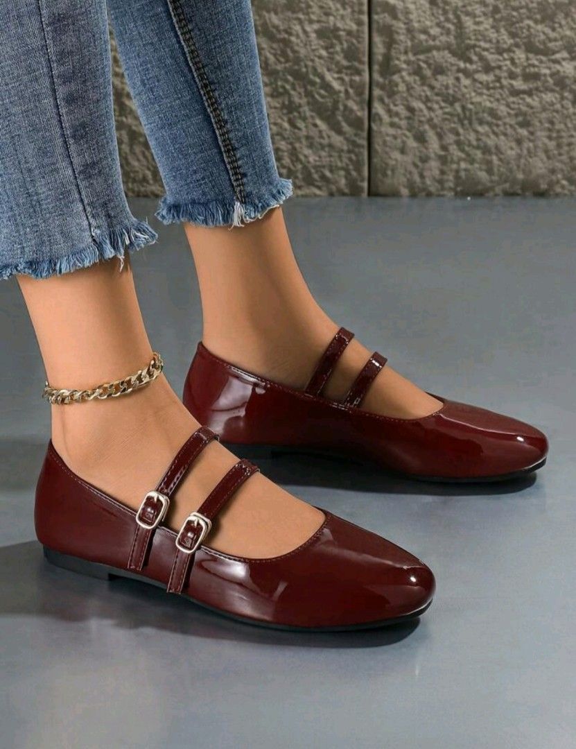 Burgundy Red Double Strap Mary Jane Flats (Category: Flats & Sandals) located in Pasig City. Submitted by cherryycloset (Listing ID 1438196679, Image 1). Description: - No box - Maroon Mary Jane flats - Glossy finish - Double straps with buckle closures - Pointed toe - Unworn condition - Comfortable and stylish - Perfect for any outfit.