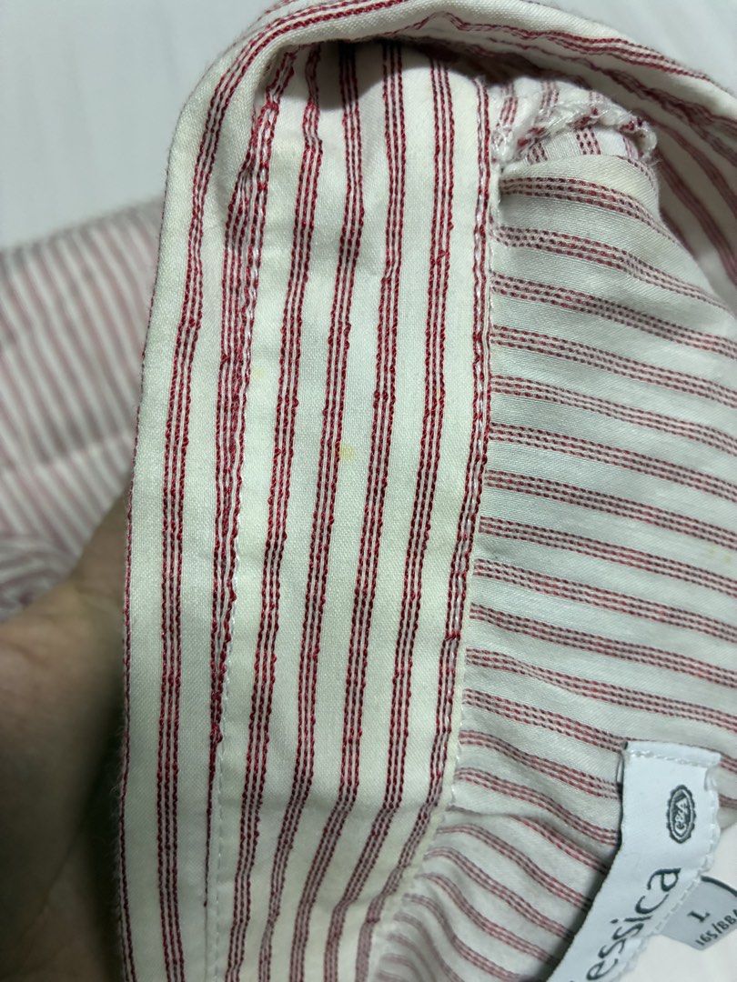 yessica red Stripes office Blouse (Category: Blouses) located in Quezon City. Submitted by habits.mnl (Listing ID 1438196394, Image 2). Description: Fits medium (with slight stains) - Red and white striped blouse - large on tag - Features short, ruched sleeves - Collared neckline - Red button-down front - Minor stains on collar.