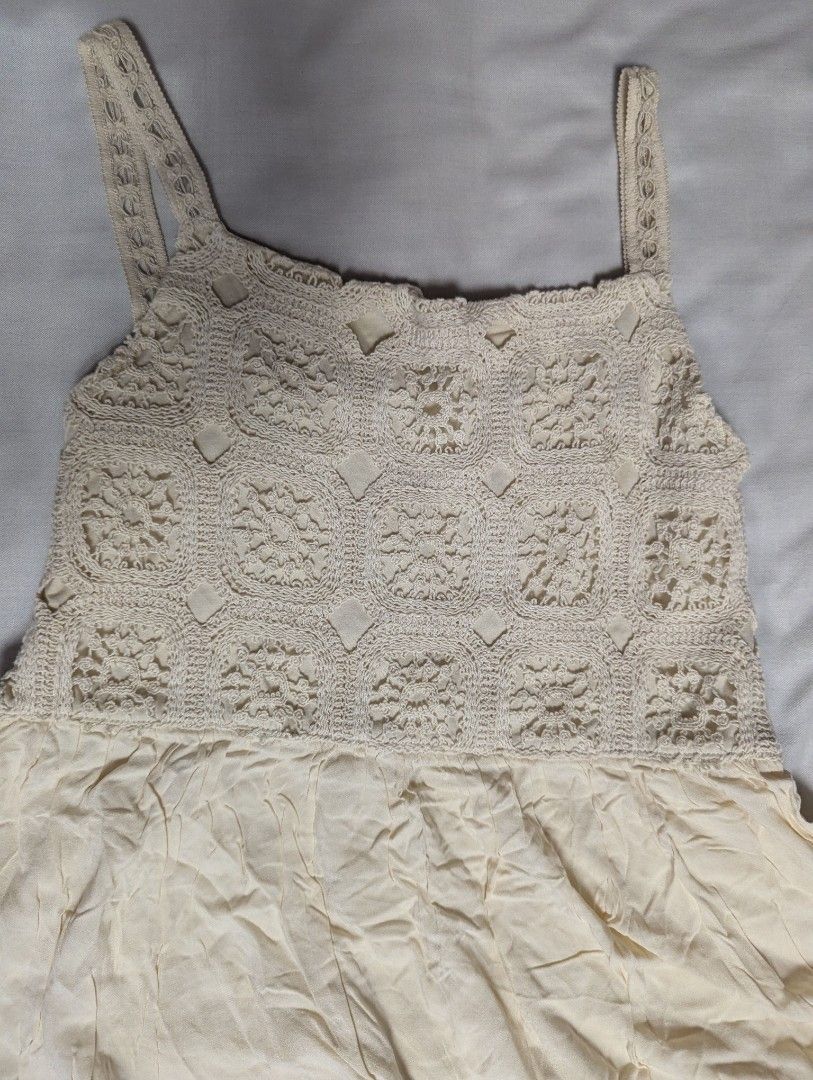 Calliope Crochet Maxi Dress (Category: Dresses) located in Quezon City. Submitted by llue_ (Listing ID 1438190138, Image 3). Description: - Calliope maxi dress - Crochet bodice - Spaghetti straps - Flowing, floor-length skirt - Neutral cream color - Size M - Perfect for special occasions or bohemian style Excellent condition. Never used, very clean, and well-maintained. Send a DM if you want more photos or details. Ready to ship! ✨.
