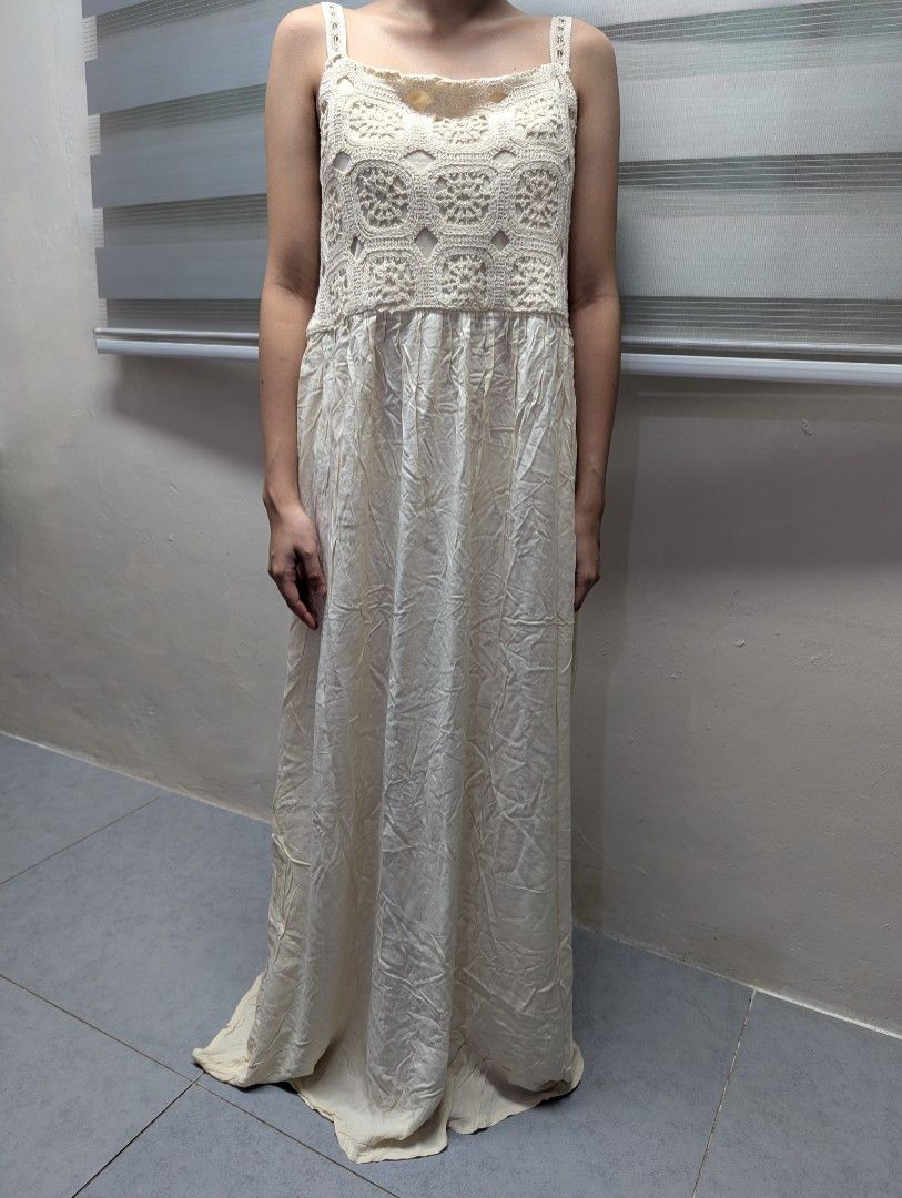 Calliope Crochet Maxi Dress (Category: Dresses) located in Quezon City. Submitted by llue_ (Listing ID 1438190138, Image 1). Description: - Calliope maxi dress - Crochet bodice - Spaghetti straps - Flowing, floor-length skirt - Neutral cream color - Size M - Perfect for special occasions or bohemian style Excellent condition. Never used, very clean, and well-maintained. Send a DM if you want more photos or details. Ready to ship! ✨.