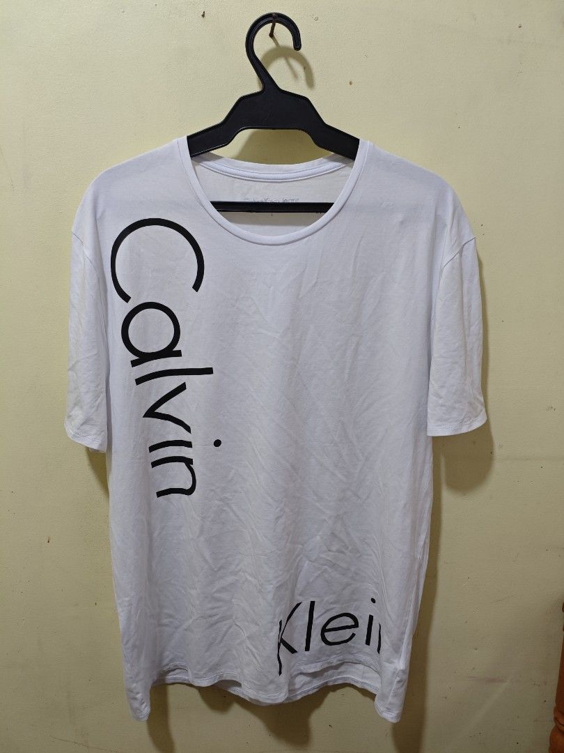 Calvin Klein White Classic Men Tshirt (Category: Tshirts & Polo Shirts ) located in Baguio. Submitted by jayjay_apparel01 (Listing ID 1438191228, Image 1). Description: Calvin Klein White Classic Men Tshirt Color Rate 9.8/10 Like New Complete Tags Soft Tela Need Wash Size XL Dimes 22 Width 27 Length Price P399.