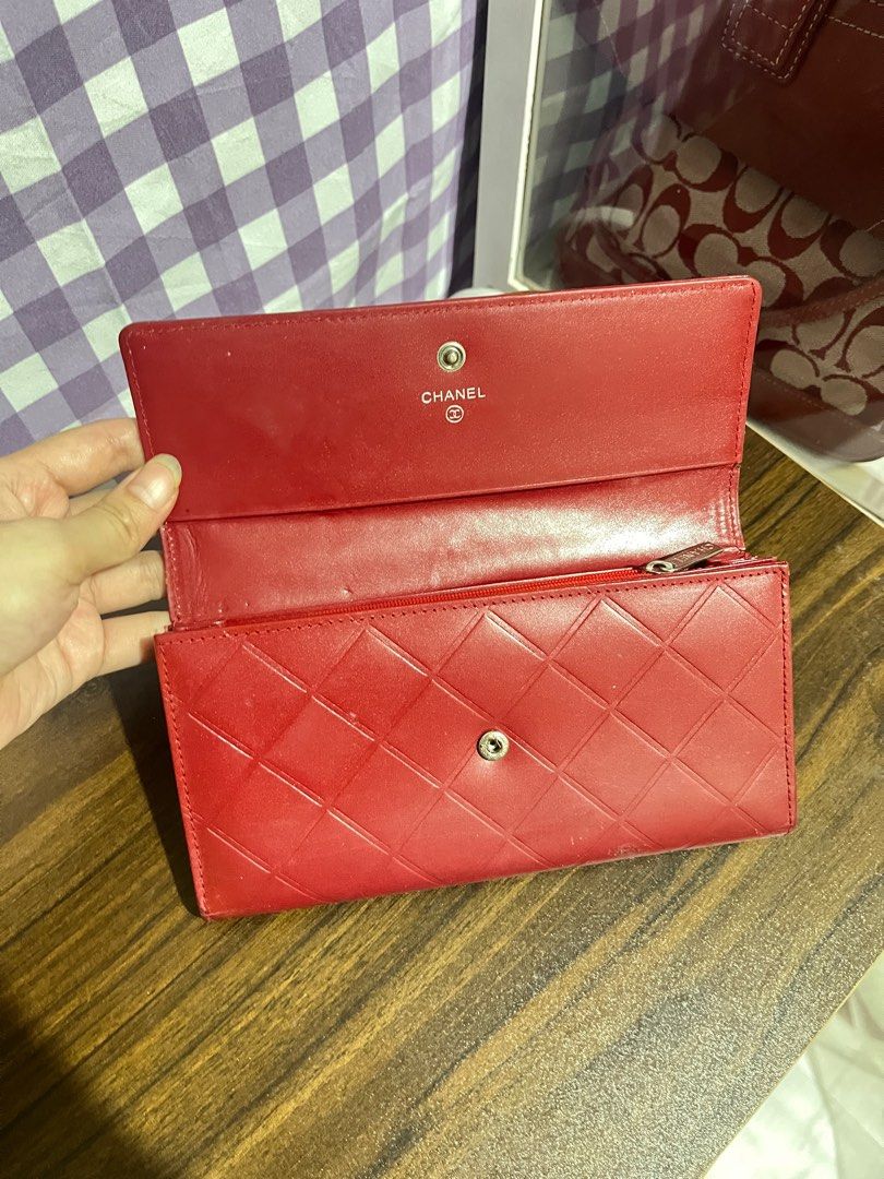Chanel Red Leather Wallet (Category: Luxury Bags & Wallets) located in Paranaque City. Submitted by prelovedbypachi (Listing ID 1438231779, Image 2). Description: Chanel red wallet. Classic diamond-quilted design with the iconic Chanel logo. With issues.