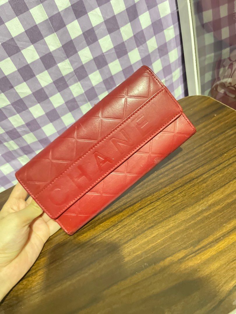 Chanel Red Leather Wallet (Category: Luxury Bags & Wallets) located in Paranaque City. Submitted by prelovedbypachi (Listing ID 1438231779, Image 1). Description: Chanel red wallet. Classic diamond-quilted design with the iconic Chanel logo. With issues.
