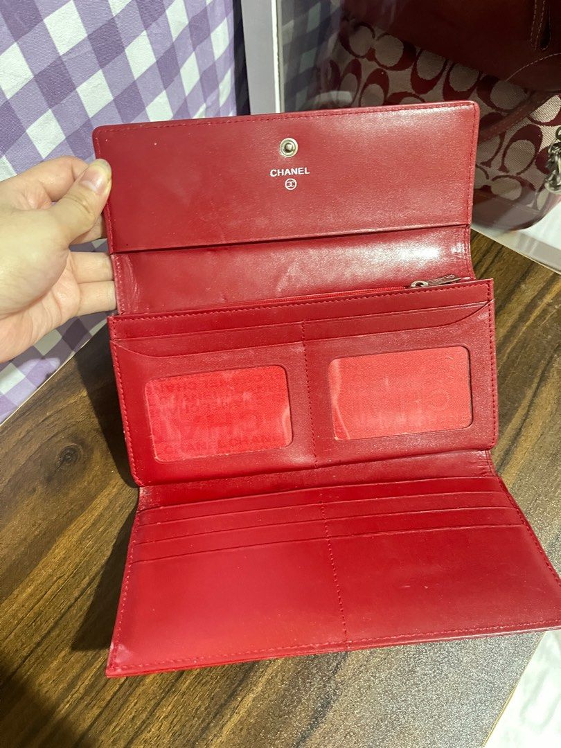 Chanel Red Leather Wallet (Category: Luxury Bags & Wallets) located in Paranaque City. Submitted by prelovedbypachi (Listing ID 1438231779, Image 3). Description: Chanel red wallet. Classic diamond-quilted design with the iconic Chanel logo. With issues.