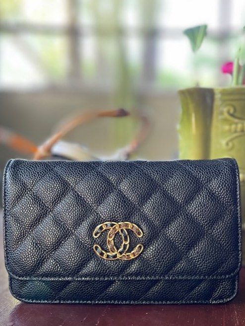 Chanel Wallet on Chain Black Caviar Leather (Category: Sling Bags) located in Laoag. Submitted by sauler (Listing ID 1402289602, Image 2). Description: Paldo kayo paunahan nalang - Black caviar leather - Gold-tone CC logo - Chain strap for shoulder/crossbody - Flap closure Code/holo sticker inside.